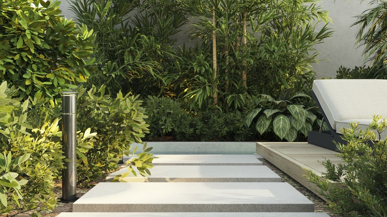 3D Rendering, illustration of a sunbathing bed and steps with furniture. in a green garden, trees and shrubbery